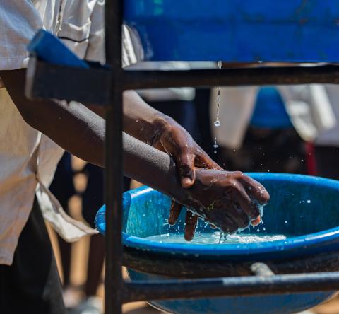 Child washing hands
